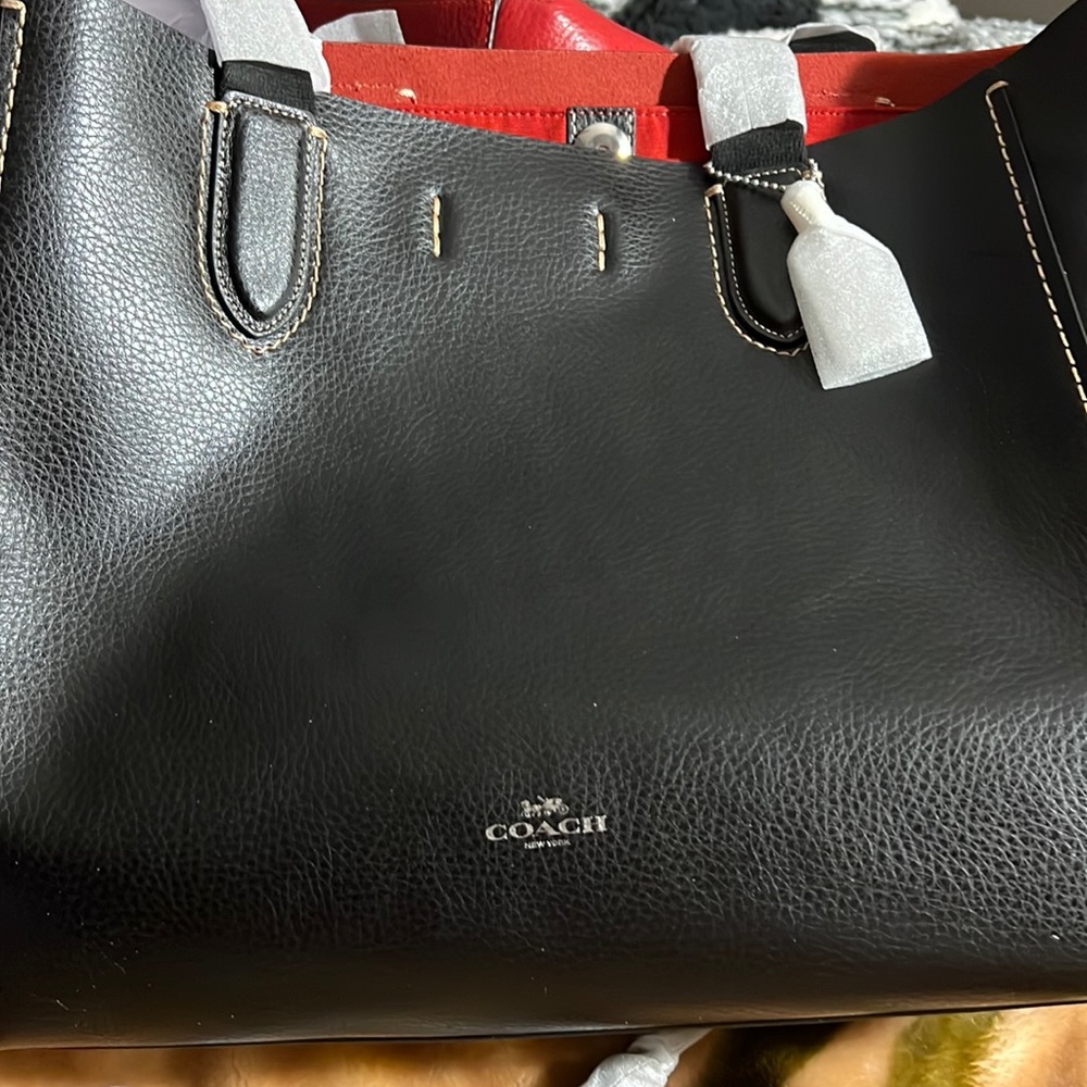 Selling new DRBY TOTE black Coach bag.